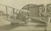 Collett standing beside the Sopwith Pup, in front of a hangar, he used extensively during May, June and July, 1917. (photo Courtesy of Mr Clive E. Collett) - No known copyright restrictions