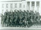 Captain William Palmer (2nd from right, front row) with The Legion of Frontiersmen on steps of Auckland Museum - No known copyright restrictions