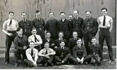 Joseph Gaunt and The Armourers 75 Squadron at Feltwell in 1940. Group photograph L to R. Back Row : Adrian Styles, Derek Morris, ?, G. Fenton; Kane; Bert Simmonds, Nesbitt, Jones; Vic Trott; Middle : McClure, Jackson, Hart, Taylor, Longstaff; Front : ?; Dyson, ?, Priestley, Joe Gaunt. - This image may be subject to copyright