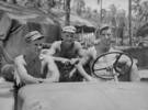 Group, 3 soldiers, Pacific, informal in a jeep 1943-1944. Philip Mason at left - This image may be subject to copyright