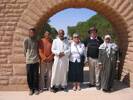 Group photograph including Mohammed Hanesh (Key Keeper) with his wife and two cemetery attendants, and Mr and Mrs Downing, March 2005. - This image may be subject to copyright