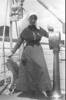 Staff Nurse Mildred D. Jackson on the bridge of HS Maheno (no date). - No known copyright restrictions