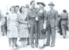 Family group, end of WW2, the Bennett family welcoming Murray Bennett home at the end of the war. The people in the photo: (rear) Forbes McLeod (uncle), Jocelyn, Heather, Marion, Murray and their mother Winifred Bennett, Jim Bennett (uncle) - This image may be subject to copyright