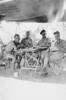Group 4 soldiers WW2 informal inside a tent - This image may be subject to copyright