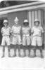 Group, WW2, 4 soldiers wearing shorts, and turban (postcard stamped front) - This image may be subject to copyright