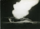 Desert, WW2, night scene, gun firing from under camoflage netting, smoke - This image may be subject to copyright