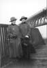 Staff Nurses Mildred Jackson 22/406 (left) and Margaret McIlwraith 22/418 (right) standing beneath the Firth of Fourth Bridge, Scotland. Date unknown. Image has no known copyright restrictions