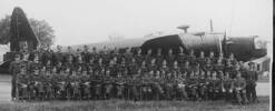 Group, WW2, airmen formally arranged in front of a bomber - This image may be subject to copyright