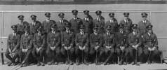 Group photo, formal of Citizens Air Force taken at Point Cook in 1926, Charlie Pratt is the 2nd from the left, front row. The men have cloth wings badge and medal ribbons. - No known copyright restrictions