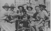 Group, WW2 on rest leave before Alamein at the Australian Club in Tel Aviv, Palestine. From left: Robbie Robinson, Dan Woodney, Syd Gilmore, Charles Griffin (foreground) Shortie Nolan (behind). - This image may be subject to copyright