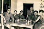 Group photograph of K Force Signals soldiers, Charlie Troop, Hiro Camp, Japan 1952 drinking a beer, including Jack Samuel Winter 203999 (2nd from right).  Image is subject to copyright.