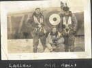 Group, WW2, RNZAF, Canada, Three airmen wearing flying gear beside a fighter plane , Left to right: Thor Larsen, Ronald Moore (NZ404554) Mr Adels (Album of Ronald Moore (NZ404554)) - This image may be subject to copyright