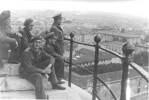 Photo 11. Taken on top of the Leaning Tower of Pisa, Italy in 1944(?). Those in the photo include Sanders, Beale, Toogood and Bracegirdle. - This image may be subject to copyright