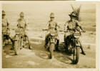 Group, four Despatch drivers on motorcycles, desert, Roy is 2nd on left - This image may be subject to copyright