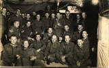 Sergeants at Christmas party c 1941; Herbert (Roy) Winchcombe is the 2nd on left ,in the front row leaning back holding a glass in his left hand; his friend Conrad Chapman (Con) (5657) is in the back far right with bald head. - This image may be subject to copyright