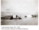 Field Hospital, Egypt, 1941-43, showing Red Cross truck and tents. - This image may be subject to copyright