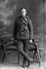 Full length portrait of Ernest John Howard Andrews, Reg No 13/2156, of the Auckland Mounted Rifles, New Zealand Mounted Rifles, 6th Reinforcements. Killed in action in France on 30 September 1916. (Photographer: Herman Schmidt, 1916). Sir George Grey Special Collections, Auckland Libraries, 31-A25. No known copyright.