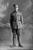 Full length portrait of Sergeant Major Beachem in military uniform (Photographer: Herman Schmidt, 1916). Sir George Grey Special Collections, Auckland Libraries, 31-B65. No known copyright.