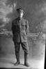 Full length portrait of Lance Corporal Alfred Beecroft , Reg No 24/1593, of the 3rd Reinforcements to the 2nd Battalion, New Zealand Rifle Brigade, - F Company. (Photographer: Herman Schmidt, 1916). Sir George Grey Special Collections, Auckland Libraries, 31-B74. No known copyright.