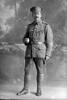 Full length portrait of Private William Birss, Reg. No. 3/1823 of the New Zealand Medical Corps. (Photographer: Herman Schmidt, 1916). Sir George Grey Special Collections, Auckland Libraries, 31-B97. No known copyright.