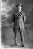 Full length portrait of Corporal Seymour Leighton Bent, Reg No 25050, of the New Zealand Engineers, Divisional Signallers, New Zealand Signal Corps. (Photographer: Herman Schmidt, 1916). Sir George Grey Special Collections, Auckland Libraries, 31-B1456. No known copyright.