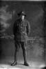 Full length portrait of Private Bertie Edwin Beeby Reg. No. 17747 15th reinforcements, J Company (Photographer: Herman Schmidt, 1916). Sir George Grey Special Collections, Auckland Libraries, 31-B1440. No known copyright.
