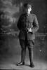 3/4 portrait of Rifleman William Boyd, Reg No 26544, of the 17th Reinforcements, 8th Reinforcements to the 4th Battalion, - H Company. New Zealand Rifle Brigade (Photographer: Herman Schmidt, 1916). Sir George Grey Special Collections, Auckland Libraries, 31-B1899. No known copyright.