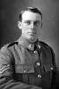 3/4 portrait of Corporal Leonard Lawrence Beresford, Reg No 31933, 13th reinforcements to 1st Battalion, - E Company, Auckland Infantry Regiment. Killed in action in France 7 Jun 1917. (Photographer: Herman Schmidt, 1916). Sir George Grey Special Collections, Auckland Libraries, 31-B2385. No known copyright.