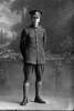 Full length portrait of Lance- Corporal Ernest Robert Baker, Reg No 46260, Auckland Infantry Regiment, - A Company, 25th Reinforcements. (Photographer: Herman Schmidt, 1917). Sir George Grey Special Collections, Auckland Libraries, 31-B2669. No known copyright.