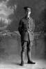 Full length portrait of Corporal (later Sergeant) Thomas Murdy Ball, Reg No 46223, New Zealand Engineers Tunnelling Company, 5th Reinforcements. (Photographer: Herman Schmidt, 1917). Sir George Grey Special Collections, Auckland Libraries, 31-B2670. No known copyright.
