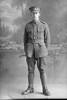Full length portrait of Sapper Alan Edwin Davis, Reg No 4/1765, New Zealand Engineers Tunnelling Company (Photographer: Herman Schmidt, 1916). Sir George Grey Special Collections, Auckland Libraries, 31-D368. No known copyright.