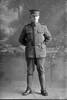 Full length portrait of Trooper Albert Hugh Delaney, Reg No 11/1789, 7th Reinforcements, Wellington Mounted Rifles. (Photographer: Herman Schmidt, 1915). Sir George Grey Special Collections, Auckland Libraries, 31-D381. No known copyright.