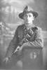 3/4 portrait of Gunner Thomas Herbert Biggs, Reg No 43396, New Zealand Field Artillery (Photographer: Herman Schmidt, 1917). Sir George Grey Special Collections, Auckland Libraries, 31-B3556. No known copyright.