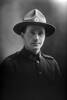 1/2 portrait of Private Wyndham Dundas Birkett, Reg No 77179, New Zealand Medical Corps (Photographer: Herman Schmidt, 1917). Sir George Grey Special Collections, Auckland Libraries, 31-B4053. No known copyright.