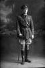 Full length portrait of Captain Blayney of the Royal Flying Corps, probably from the Walsh Brothers' New Zealand Flying School at Kohimarama, Auckland. (Photographer: Herman Schmidt, ). Sir George Grey Special Collections, Auckland Libraries, 31-B4071. No known copyright.