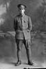 Full length portrait of Lance Corporal Stanley Norman Chatfield, Reg No 13312, of the New Zealand Mounted Rifles. (Photographer: Herman Schmidt, 1916). Sir George Grey Special Collections, Auckland Libraries, 31-C218. No known copyright.
