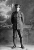 Full Length portrait of Rifleman Leonard Morton Hartley Cheriton, Reg No 26/531, of the New Zealand Rifle Brigade, 4th Battalion, D Company. (Photographer: Herman Schmidt, 1916). Sir George Grey Special Collections, Auckland Libraries, 31-C224. No known copyright.