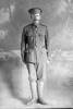 Full length portrait of Sapper William Coldicutt, Reg No 4/1244 of the New Zealand Tunnelling Company. (Photographer: Herman Schmidt, 1915). Sir George Grey Special Collections, Auckland Libraries, 31-C275. No known copyright.