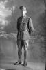 Full length portrait of Private Charles Ernest Cleveland, Reg No 33837, of the Auckland Infantry Battalion, - A Company, 21st Reinforcements. (Photographer: Herman Schmidt, 1917). Sir George Grey Special Collections, Auckland Libraries, 31-C2232. No known copyright.