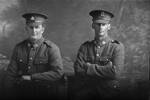 3/4 portrait of two men of the 20th Reinforcements. On the right is Private (later Lance Corporal) Richard Cornthwaite, Reg No 34331, of E Company. (Photographer: Herman Schmidt, 1916). Sir George Grey Special Collections, Auckland Libraries, 31-C2245. No known copyright.