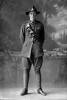 Full length portrait of Gunner Arthur James Cliff, Reg No 42996, of the New Zealand Field Artillery, 24th Reinforcements. (Photographer: Herman Schmidt, 1917). Sir George Grey Special Collections, Auckland Libraries, 31-C2708. No known copyright.