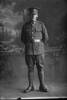 Full length portrait of Private (Later Lance Corporal) Stanley Murdock Bradburn, Reg No 52369, of the 27th Reinforcements, - E Company. (Photographer: Herman Schmidt, 1917). Sir George Grey Special Collections, Auckland Libraries, 31-B3019. No known copyright.
