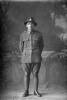 Full length portrait of Private John Charles Alexander Chaplin, Reg No 49692, of the Auckland Infantry Regiment, - A Company, 27th Reinforcements, later with the New Zealand Rifle Brigade. Killed in action in France on 26th May 1918. (Photographer: Herman Schmidt, 1917). Sir George Grey Special Collections, Auckland Libraries, 31-C3056. No known copyright.