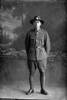 Full length portrait of Private Leslie Christian Coulthard, Reg No 52160, of the Auckland Infantry Regiment, - A Company, 28th Reinforcements. (Photographer: Herman Schmidt, 1917). Sir George Grey Special Collections, Auckland Libraries, 31-C3331. No known copyright.