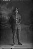 Full length portrait of Rifleman Arthur Rogers Coventry, Reg No 55587, of the New Zealand Rifle Brigade, - G Company. (Photographer: Herman Schmidt, 1917). Sir George Grey Special Collections, Auckland Libraries, 31-C3336. No known copyright.