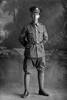 Full length portrait of Sergeant Major Frederick Widdowson Doidge, Reg No 20913, of the Auckland Infantry Battalion, - A Company. 18th Reinforcements. (Photographer: Herman Schmidt, 1916). Sir George Grey Special Collections, Auckland Libraries, 31-D1946. No known copyright.