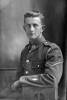 3/4 portrait of Lance Corporal Leslie Richard Dillicar, Reg No 71735, of the 38th Reinforcements, C Company, with a badge of the Specialist Company. (Photographer: Herman Schmidt, 1918). Sir George Grey Special Collections, Auckland Libraries, 31-D3666. No known copyright.