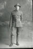 Full length portrait of Lance Corporal A Edwards, of the New Zealand Rifle Brigade. (Photographer: Herman Schmidt, 1916). Sir George Grey Special Collections, Auckland Libraries, 31-E1972. No known copyright.