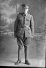 Full length portrait of Private John Edmund Geraghty, Reg No 11455, of the Auckland Infantry Battalion, A Company, 12th Reinforcements (Photographer: Herman Schmidt, 1916). Sir George Grey Special Collections, Auckland Libraries, 31-G471. No known copyright.