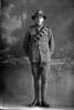 Full length portrait of Private John Glasson, Reg No 25068, of the New Zealand Engineers, Divisional Signallers, New Zealand Signal Corps. (Photographer: Herman Schmidt, 1916). Sir George Grey Special Collections, Auckland Libraries, 31-G491. No known copyright.